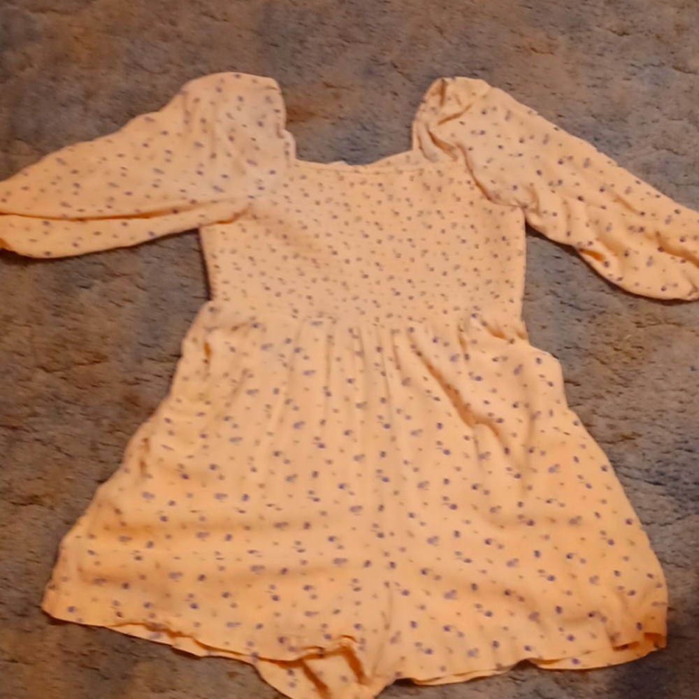 Yellow rompers with blue flowers. American Eagle size large.